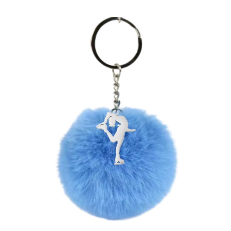 ijsschaats sleutelhanger met blauwe pompon